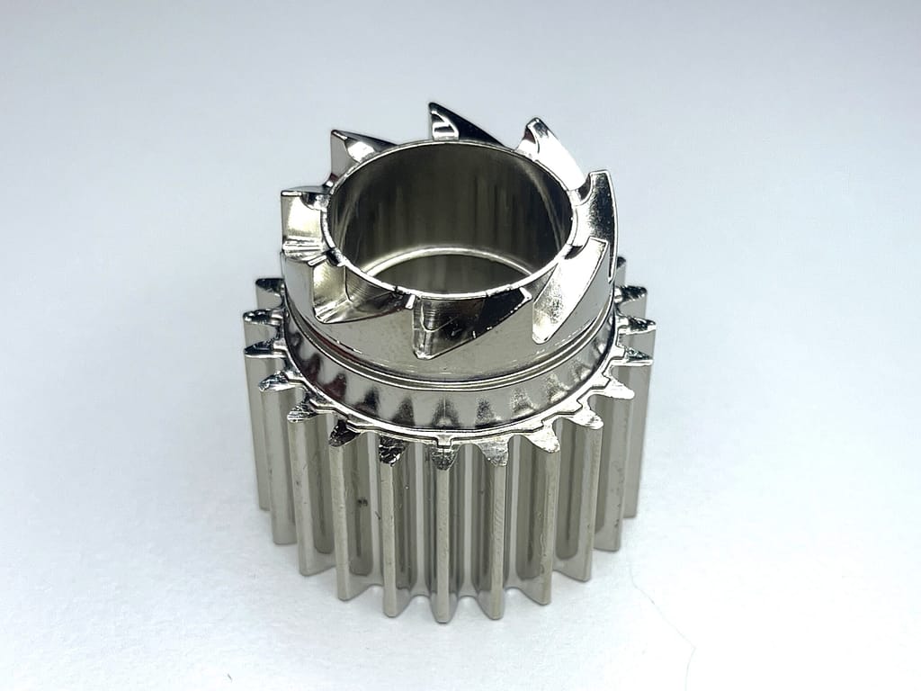 Ingranaggio zama complesso doppia corona nichelato lucido con denti dritti interni ed esterni. - Micrometal